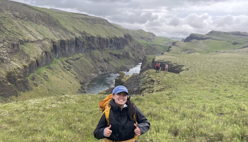 Aruna Silva with Sora Laxa river behind her