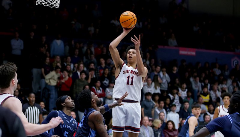 Basketball player Dillan Shaw shoots against San Diego in February 2026