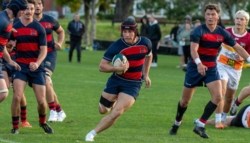 Men's Rugby player Dom Besag runs with the ball in January 2026 in New Zealand