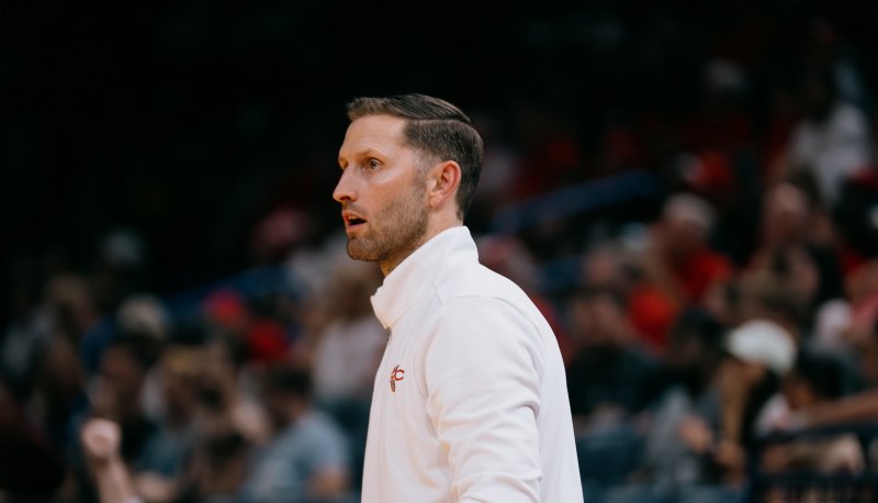 Mickey McConnell coaching on the court