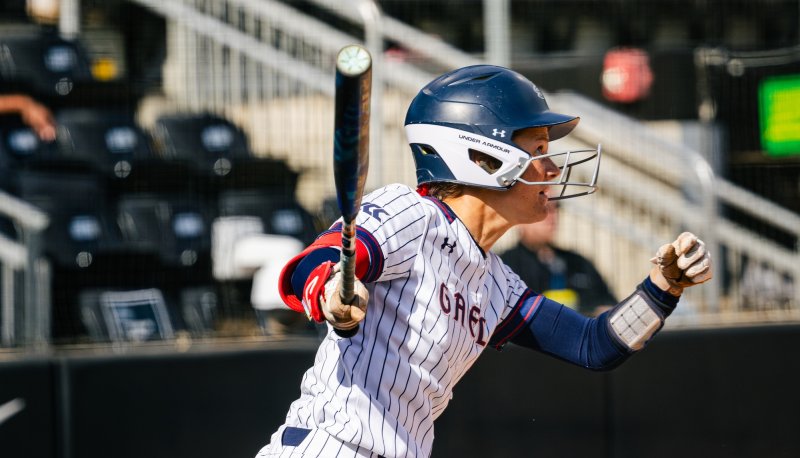 Softball player Hannah Ferguson hits the ball in 2026 NCAA Regional Final