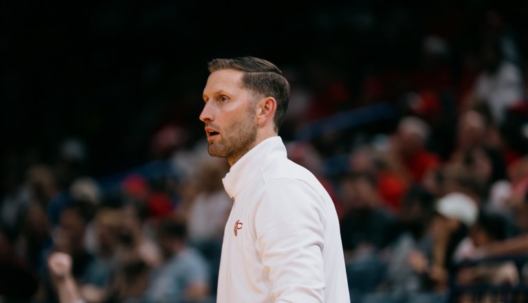 Mickey McConnell coaching on the court