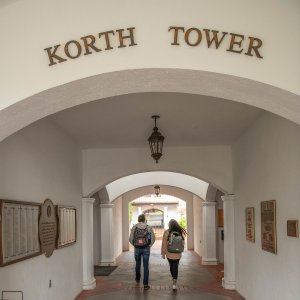 Students walk through corridor
