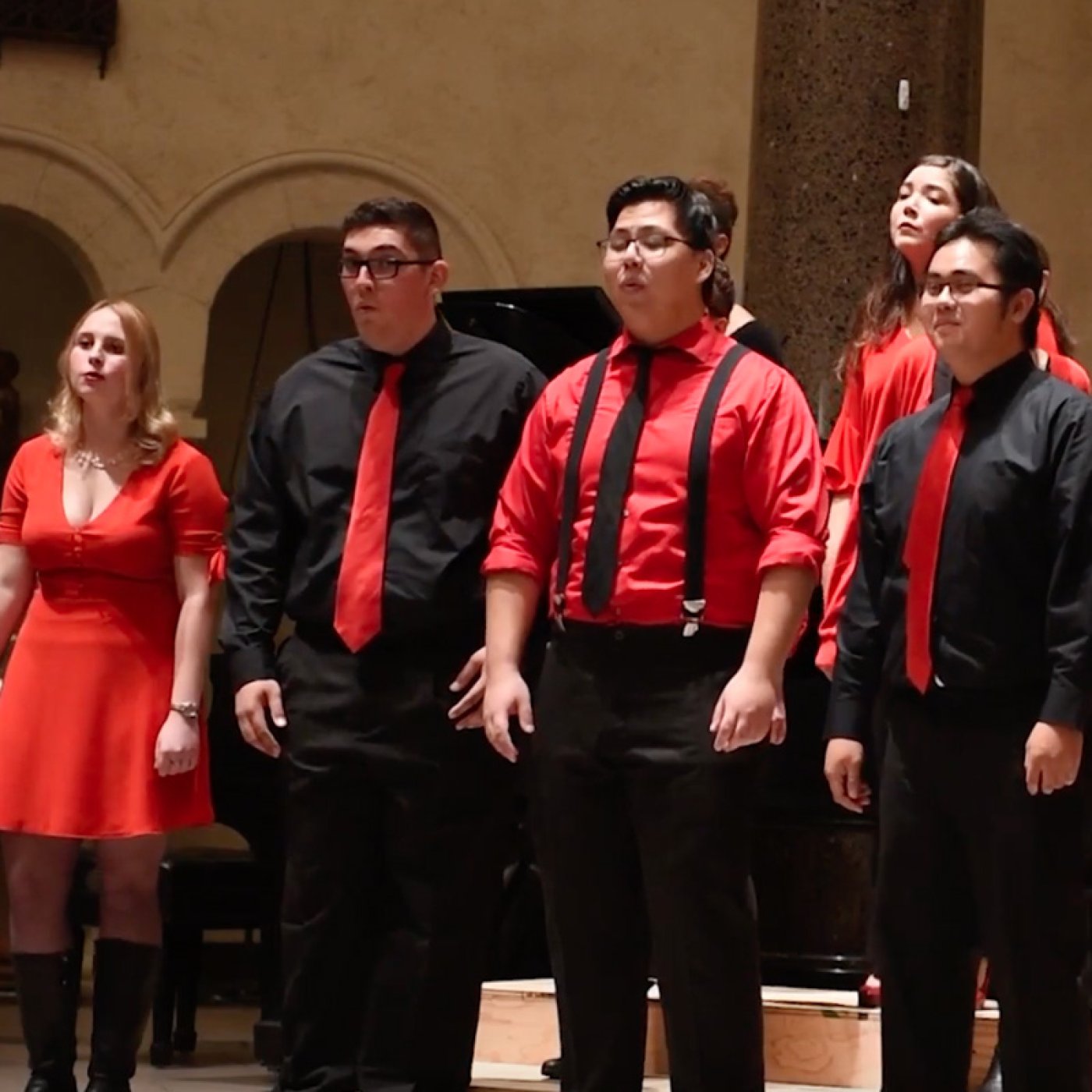 choir wearing black and red