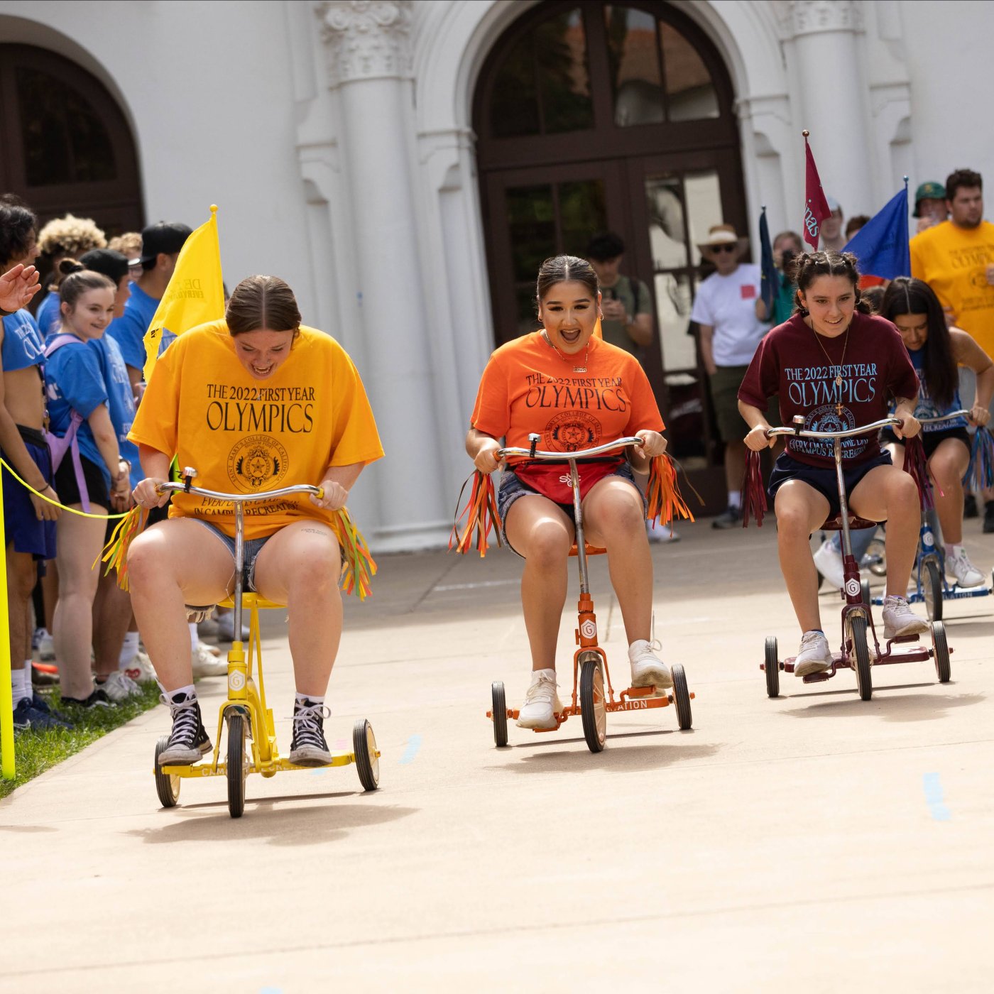 Student riding tricycles