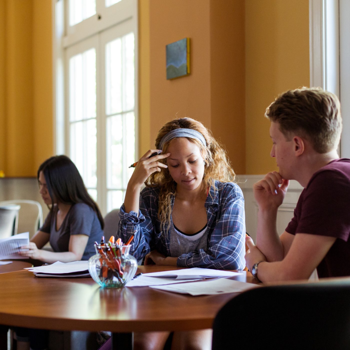 Students studying together in the writing center