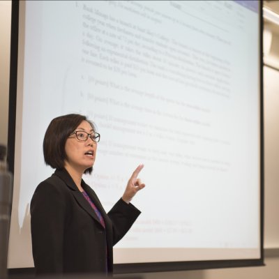 A professor is giving a lecture