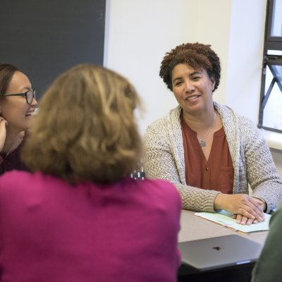 A professor is talking to students