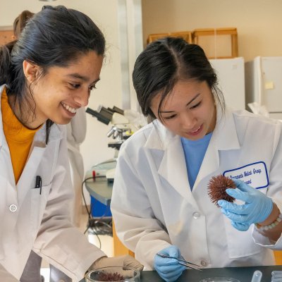 Two students in science lab of Vidya Chandrasekaran