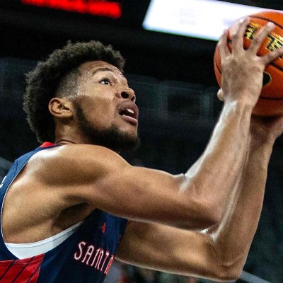 Men's Basketball player Joshua Jefferson shoots against Portland in February 2024