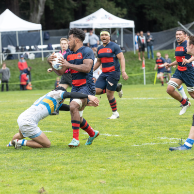 Kiapono Kayoshi carried the Rugby a ball down field.