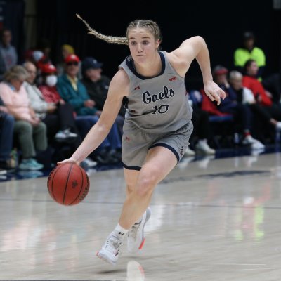 Women's basketball player Tayla Dalton drives with the ball