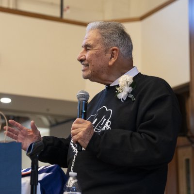 Brother Camillus Chavez speaking at his farewell event in 2022