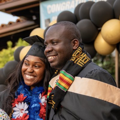 Brian Muganda MS '24 and friend at Black Graduate Celebration 2024