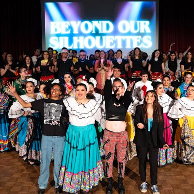 Students onstage for BEYOND OUR SILHOUETTES, the 2024 Intercultural Center Showcase
