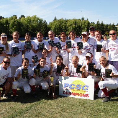 The 2010 softball players with PCSC Championship trophies