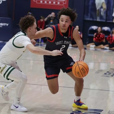 Men's Basketball player Jordan Ross drives against USF in January 2025