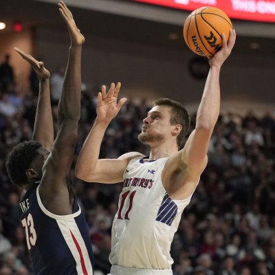 Men's Basketball player Mitchell Saxen shoots against Gonzaga in WCC Tournament Finals on March 11, 2025