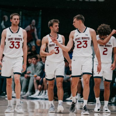 Five men's basketball players walk on the court against Gonzaga in February 2025