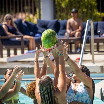 First Years Students at the Pool with a greased up water melon