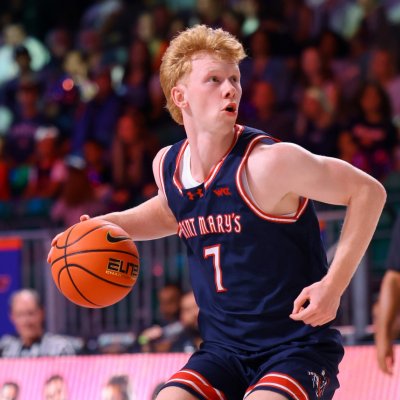 Basketball player Joshua Dent with the ball in fall 2025