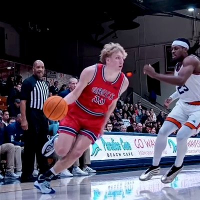Basketball player Liam Campbell drives against Pepperdine in December 2025