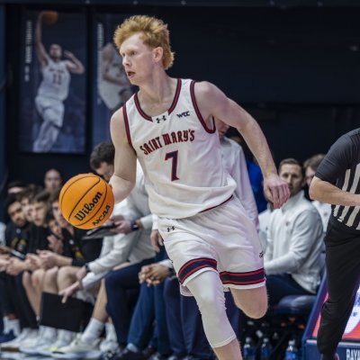 Basketball player Joshua Dent drives against OSU in January 2026