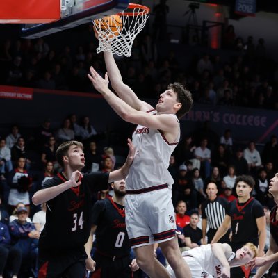 Basketball player Harry Wessels shoots against Seattle in January 2026