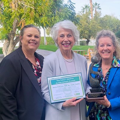 Pamela Stanley, Maria O'Rourke, Nancy Loos, and Theresa Murphy with awards for Maria O'Rourke in February 2026