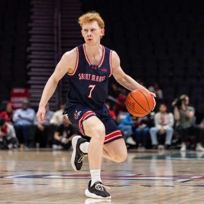 Basketball player Joshua Dent drives against Seattle in February 2026