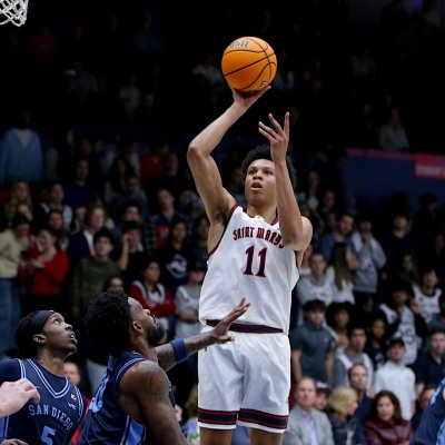 Basketball player Dillan Shaw shoots against San Diego in February 2026