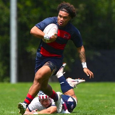 Gaels rugby player Atelea Tengei ’27 runs past an Arizona player in April 2026