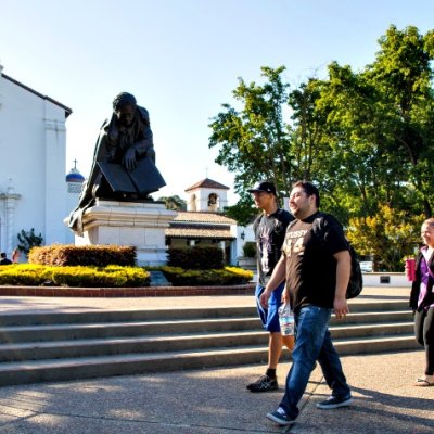 Students walking to class in front of the Saint Mary's College Chapel