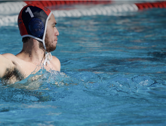A men's water polo player in the pool