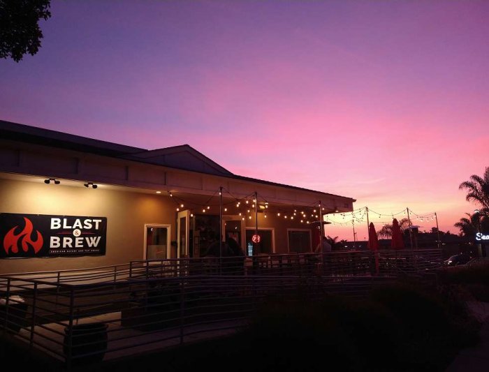Colorful twilight skies over a restaurant exterior in Pismo Beach