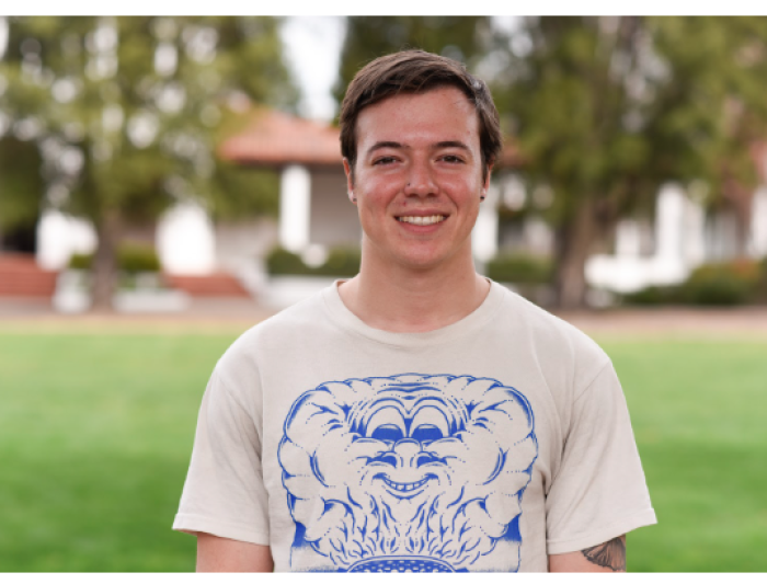 Sam Nobile Writing Studies student class of 2025 on SMC chapel lawn