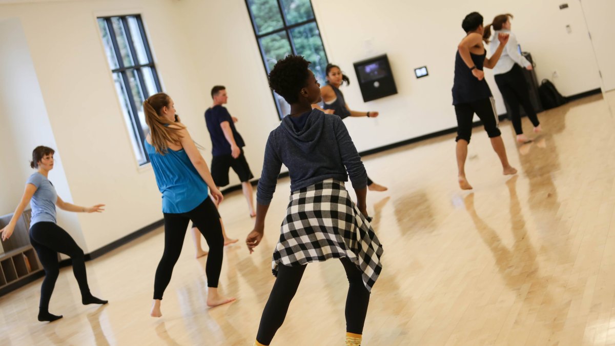 Student dancing in the exercise room