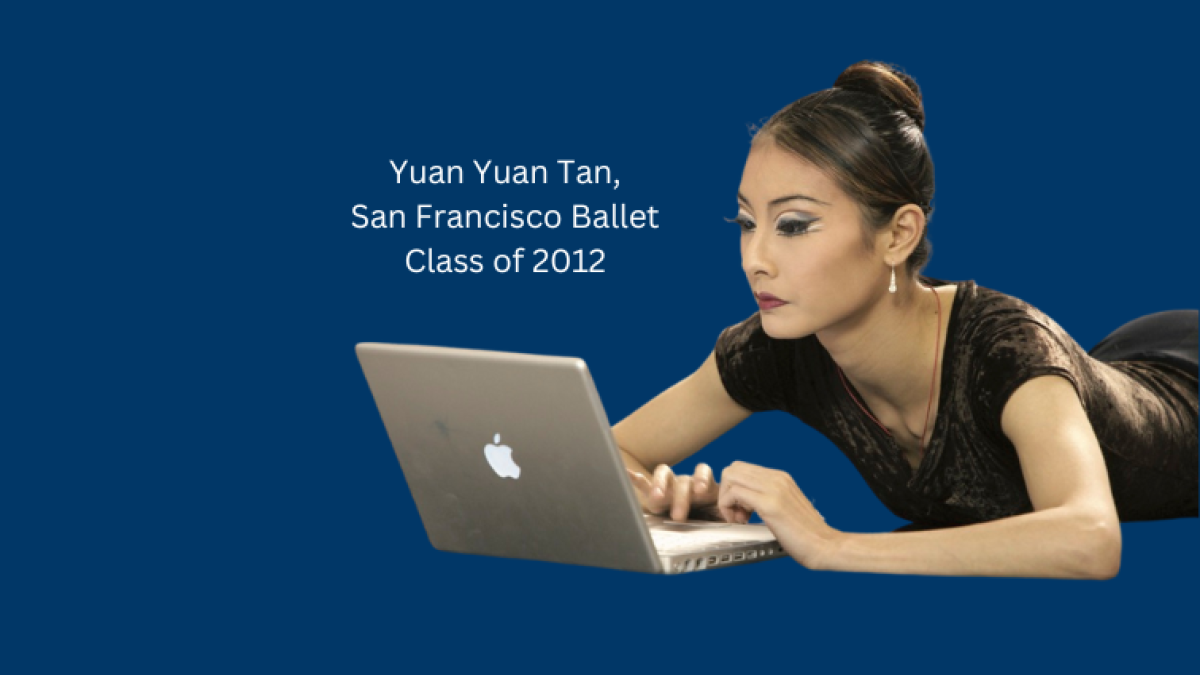 Yuan Yuan Tan working at a laptop