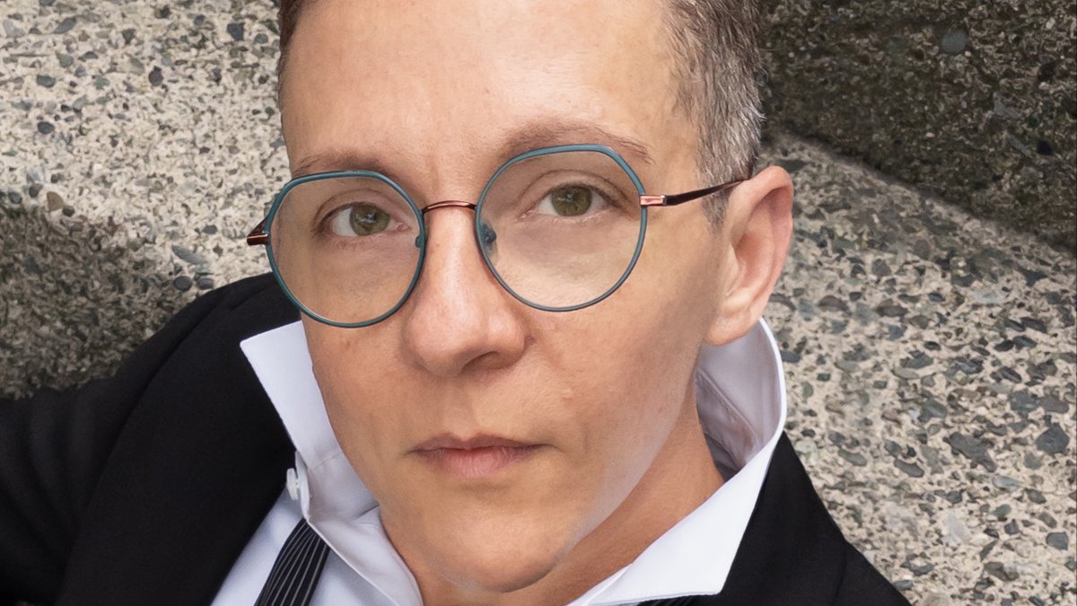 A portrait of author Alex Marzano-Lesnevich 